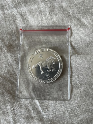 Silver 1oz round from baird - round,